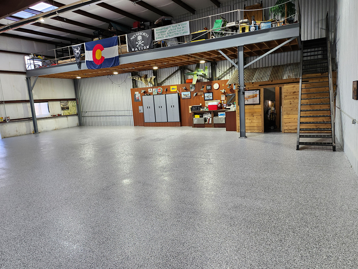 Sturdy Polyaspartic Concrete Coating for Airplane Hangar in Colorado